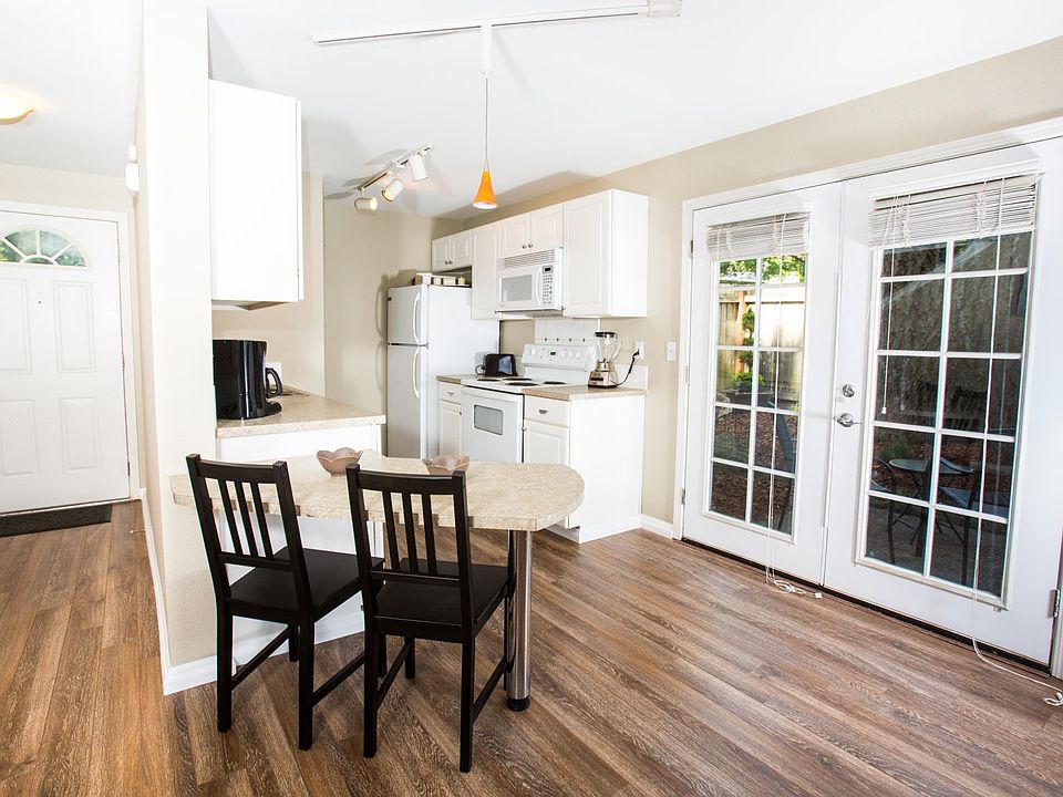 Kitchen with breakfast nook and french doors to the backyard