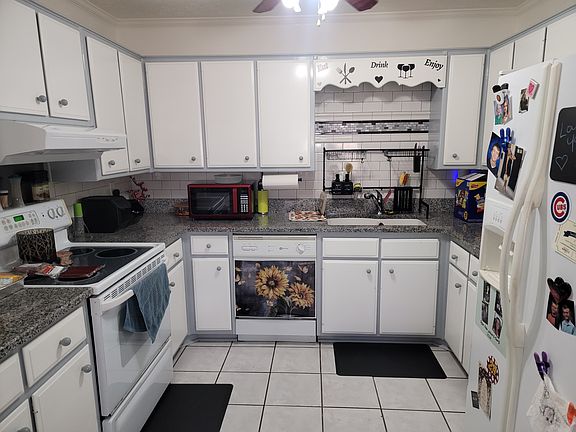 Kitchen with granite countertops.