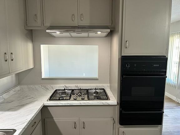 Convenient pass through window connected to living room