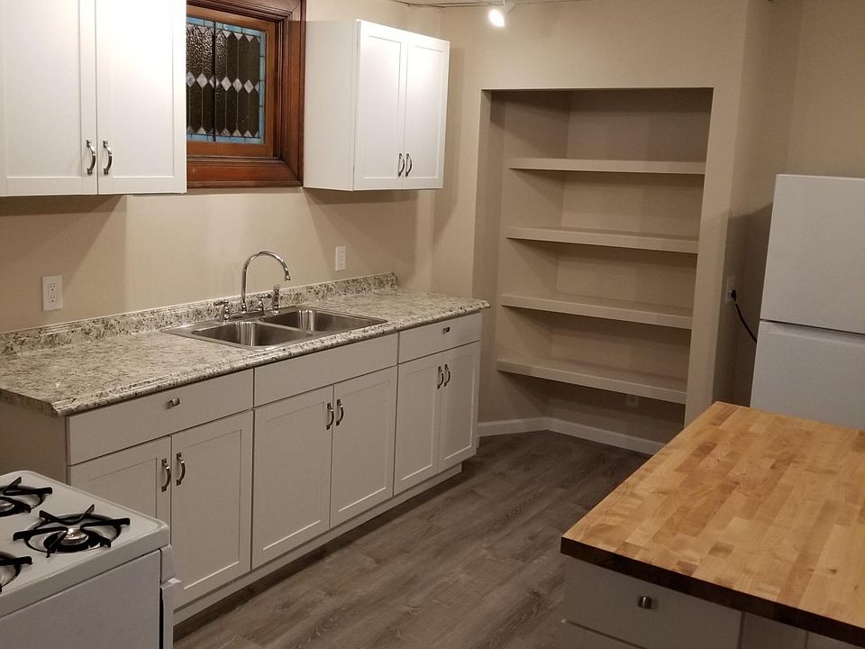 Kitchen area Appliances included - Refrigerator and Stove - In Unit Laundry