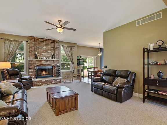 Open great room with masonary fireplace