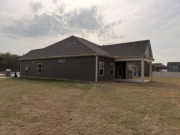 Showcasing the premium corner lot this home sits on w its extended covered back porch!