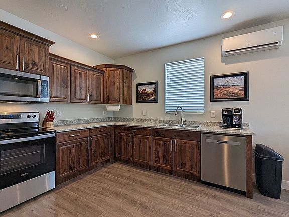 Upper right. Walnut cabinets