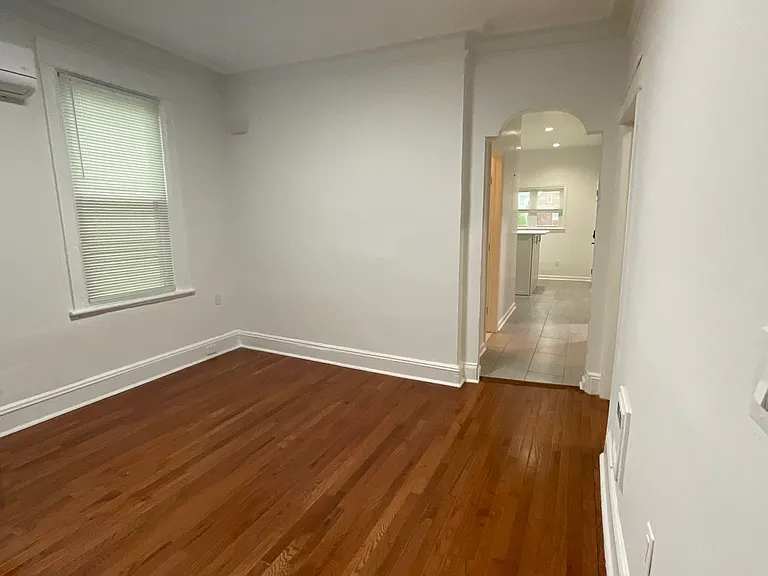 Living Room with Bedroom #2 before hallway