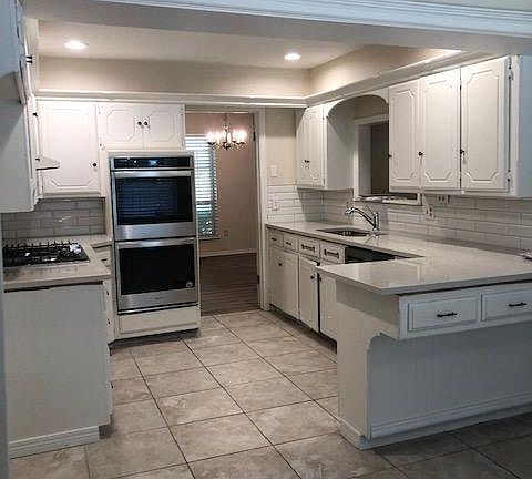 fully remodeled kitchen - stainless appliances, quartz counter tops