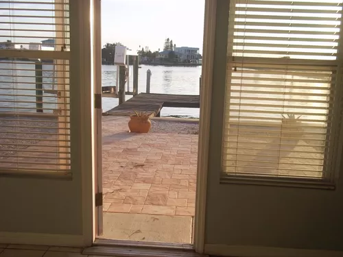 View through door from great room to paver patio and dock
Patio is 16ft x 16ft - 16016 4th St E