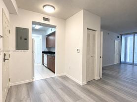 115 SW 11th St