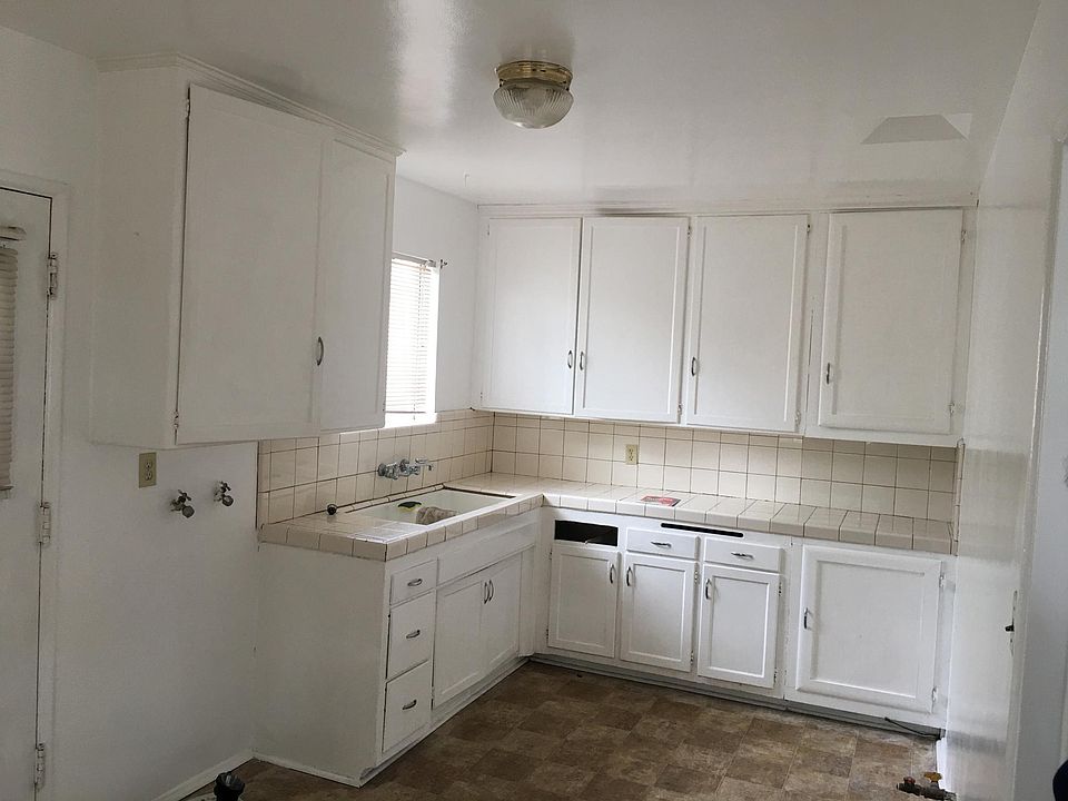 Kitchen - (cabinet has drawer- drawer removed during picture)
