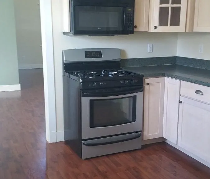 Kitchen opens to dining room and living room