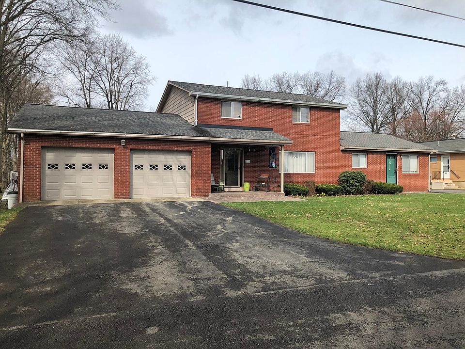 street view of house and garage