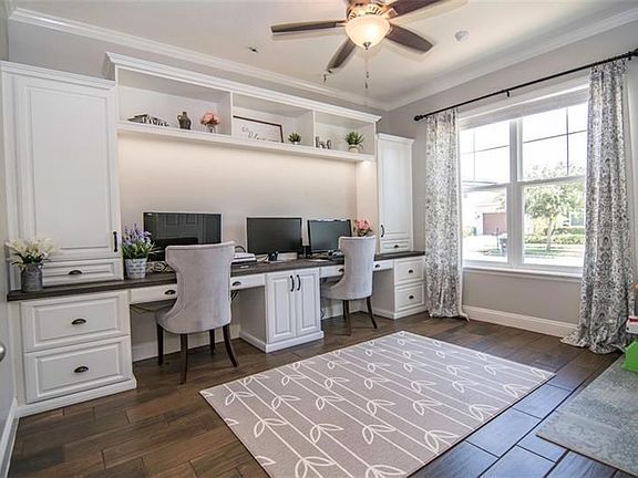 French doors to Office with Custom Built-in and crown molding