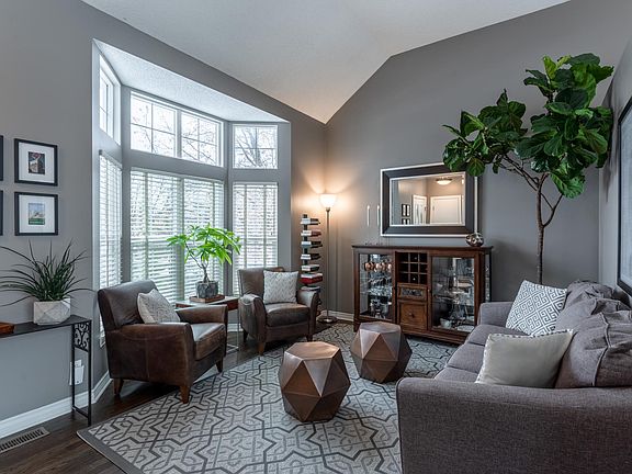 Open areas throughout the house make for a graceful, peaceful home. The formal living area is steps off the kitchen for easy entertaining.