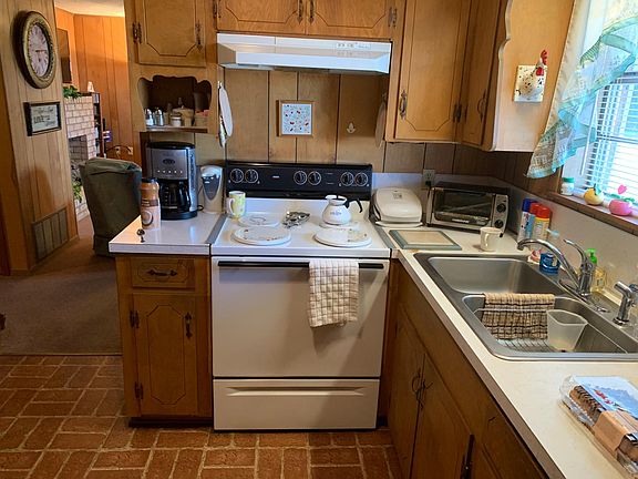 Kitchen stove and sink.