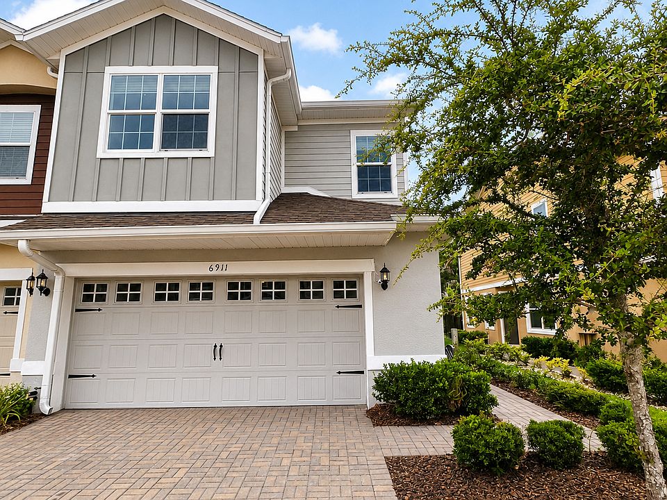 Beautiful 2019 townhome with a 2-car garage in the gated Goldenrod Reserve community.
