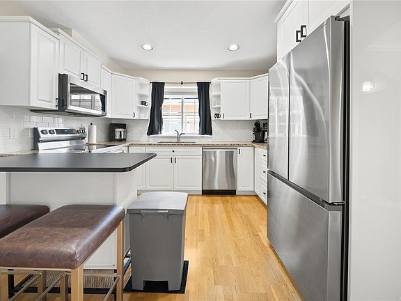 4th image of 6025 Tweedsmuir Cres