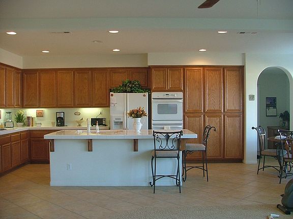 Kitchen w/ Large Island (Sink) and Dining Nook 