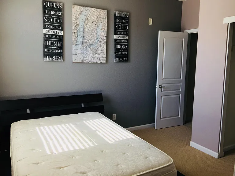 2nd Bedroom - this view is from the full bathroom inside the room looking out to the bedroom. Furniture is not included, just shown for staging purposes.