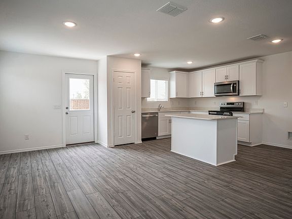 View of dining and kitchen areas