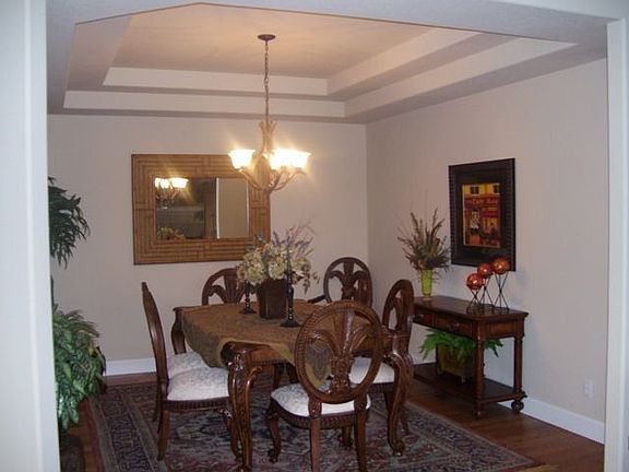 Formal dining room with coffered ceiling
