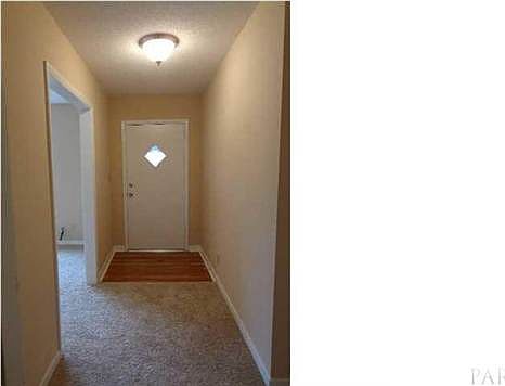 Looking back after you have entered the foyer. Beautiful hardwood flooring in the Foyer.