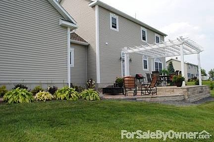 Stone Patio
						:
						Stone walkway leading to pergola covered patio. Water feature.