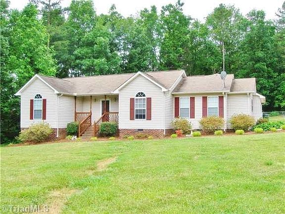 Large front lawn with charming porch