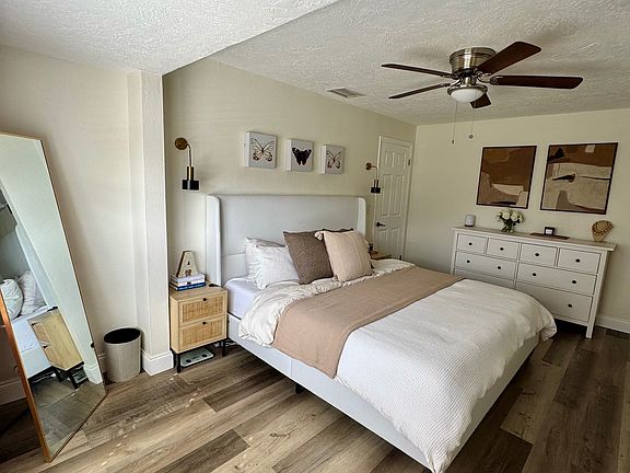 Primary bedroom - King bed featured in picture, 2 closets in bedroom, private bathroom