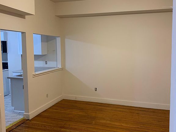 Dining room, wood floors, ceiling fan