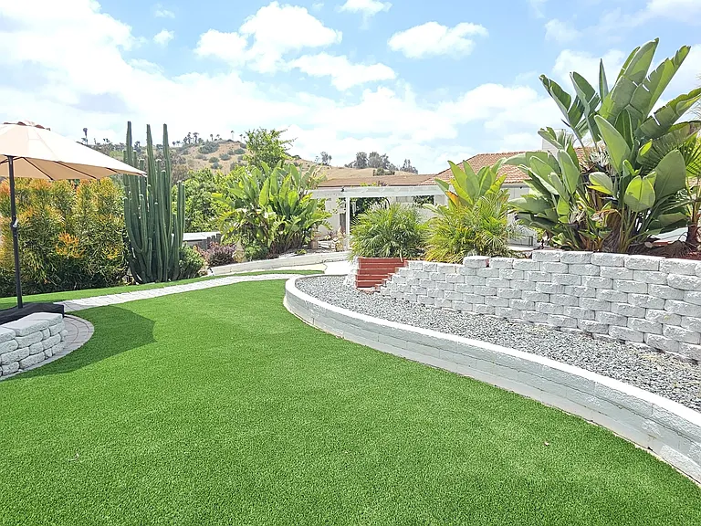 Outdoor area is great for fires, griling, or just hanging out. Umbrella canopy, and Santa Maria grill included with house!