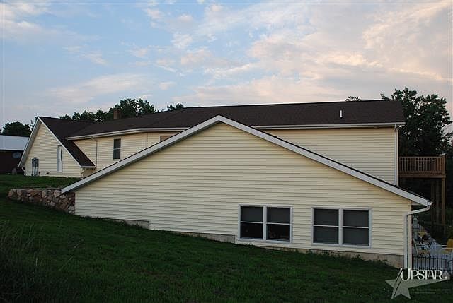 Back Windows face 10 acres of field