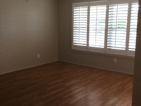 Beautiful Hardwood/Laminiate Flooring and Plantation Shutter