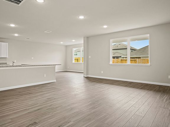 Family Room to Kitchen and Dining Area