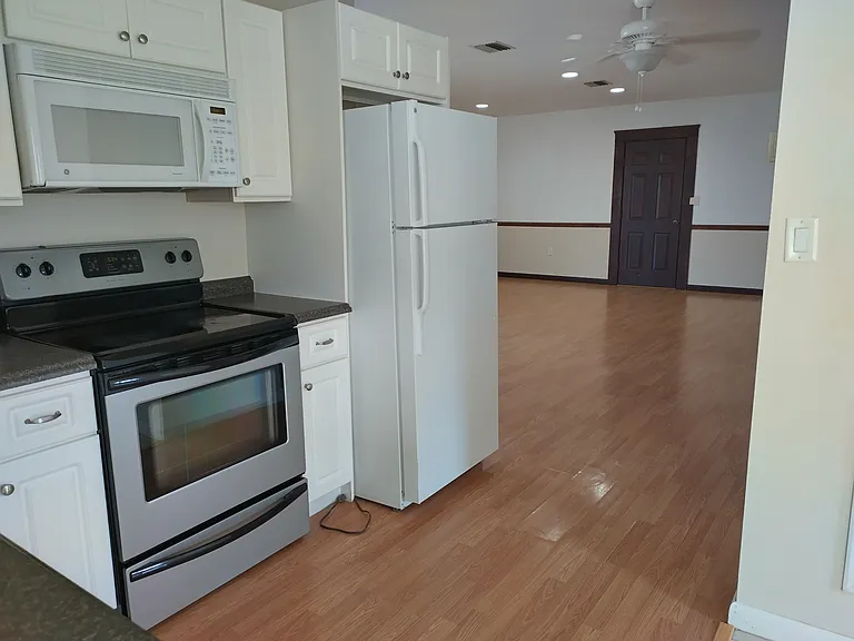 The kitchen looking toward the living room.