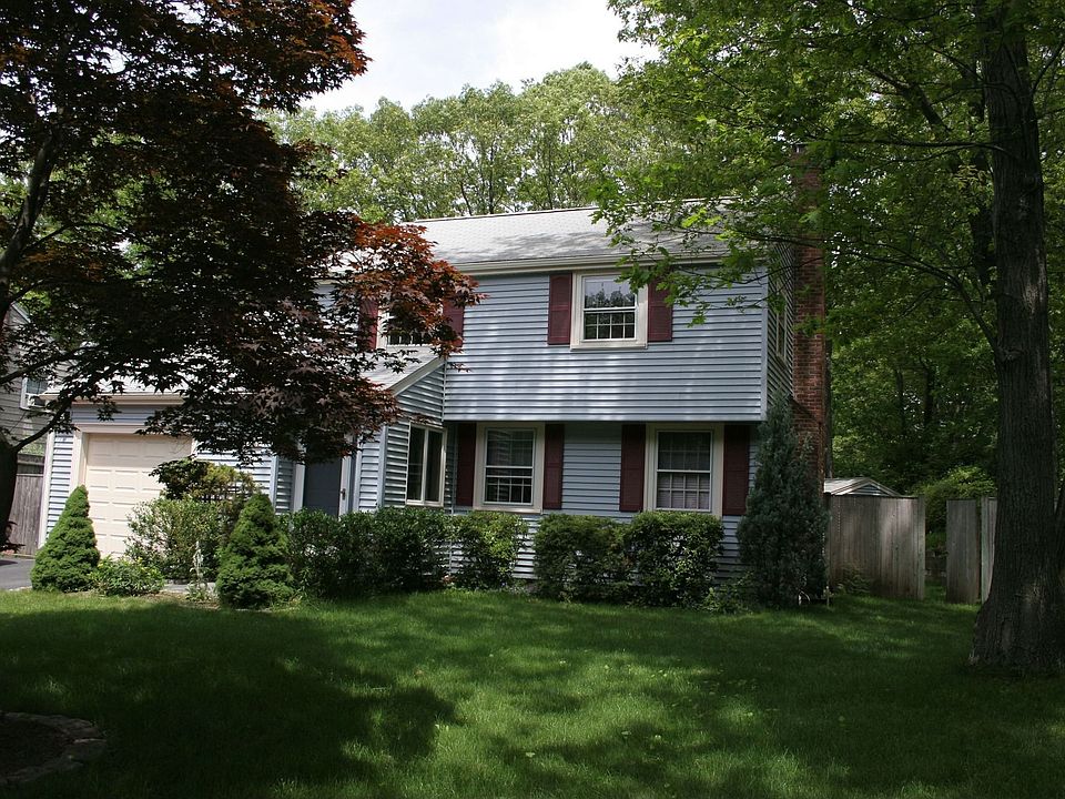 Front view w/tree in bloom