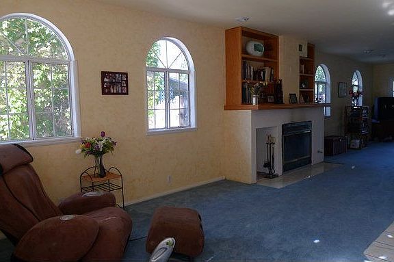 Living room features fireplace