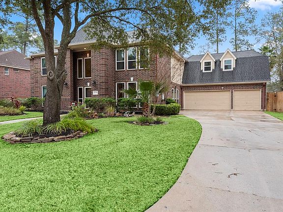 Lush landscaping with full yard sprinkler system, Energy efficient double pane windows throughout and over-sized 3 car garage.