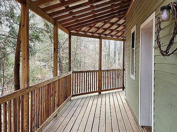 covered wrap around deck, both bedrooms open onto the deck