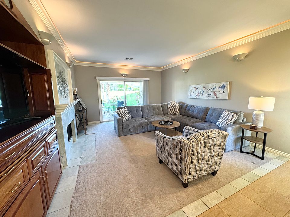Living room with brand new sectional sofa and carpet!
