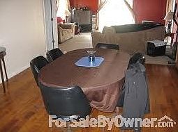 Dining room with living room in back