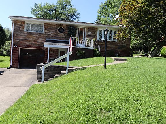 Four car concrete driveway