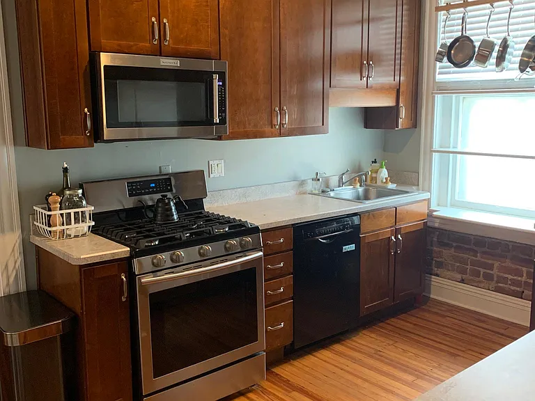 Kitchen (includes brand new dishwasher, updated gas stove/range combo and refrigerator/freezer