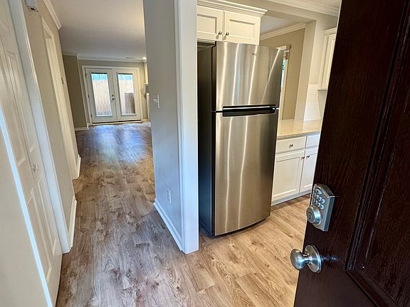 Front Door: Keypad with key option
Front entrance: kitchen on right, steps to upstairs on the left