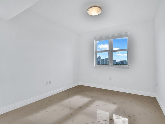 3rd image of 19900 E Country Club Dr APT 902