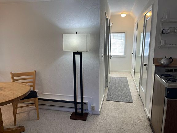 Bathroom, closet and ample storage down entry hall.