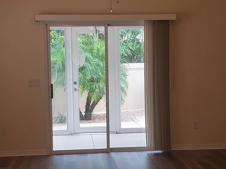 Pretty view of backyard from kitchen, dining and living room.