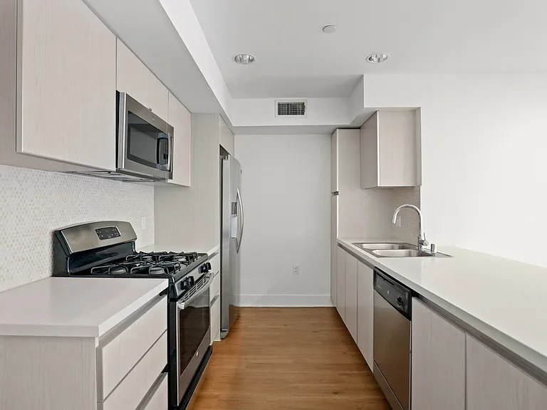 Kitchen with Stainless Steel Appliances and Ample Cabinet Storage
