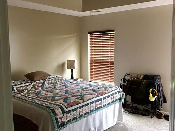 Master Bedroom with tray ceiling and attached Bathroom