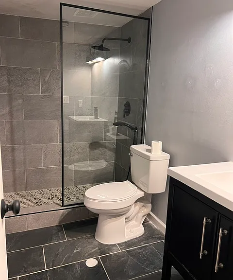 Updated full bathroom in the finished basement.