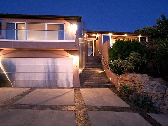 Front Elevation with Stainless Steel Garage and Stainless Steel Accents