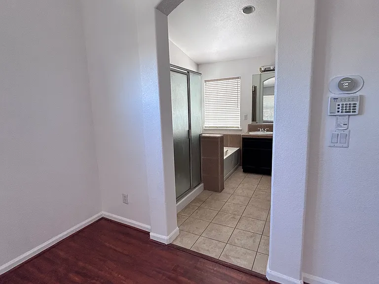 Leading into Master Bathroom